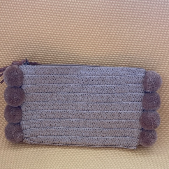 Beach Days Pom Pom Oversized Straw Clutch, Natural zipper closure 
10” x 7” - Picture 4 of 6
